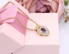 Złota zawieszka p.750/2,94g z fioletowym kamieniem    ŁZ