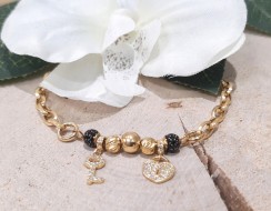 Złota bransoletka p.585/6,05g z designerskimi zawieszkami al.14