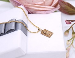 Złota zawieszka p.333/0,78g -  wizerunkiem Matki Boskiej  ŁS